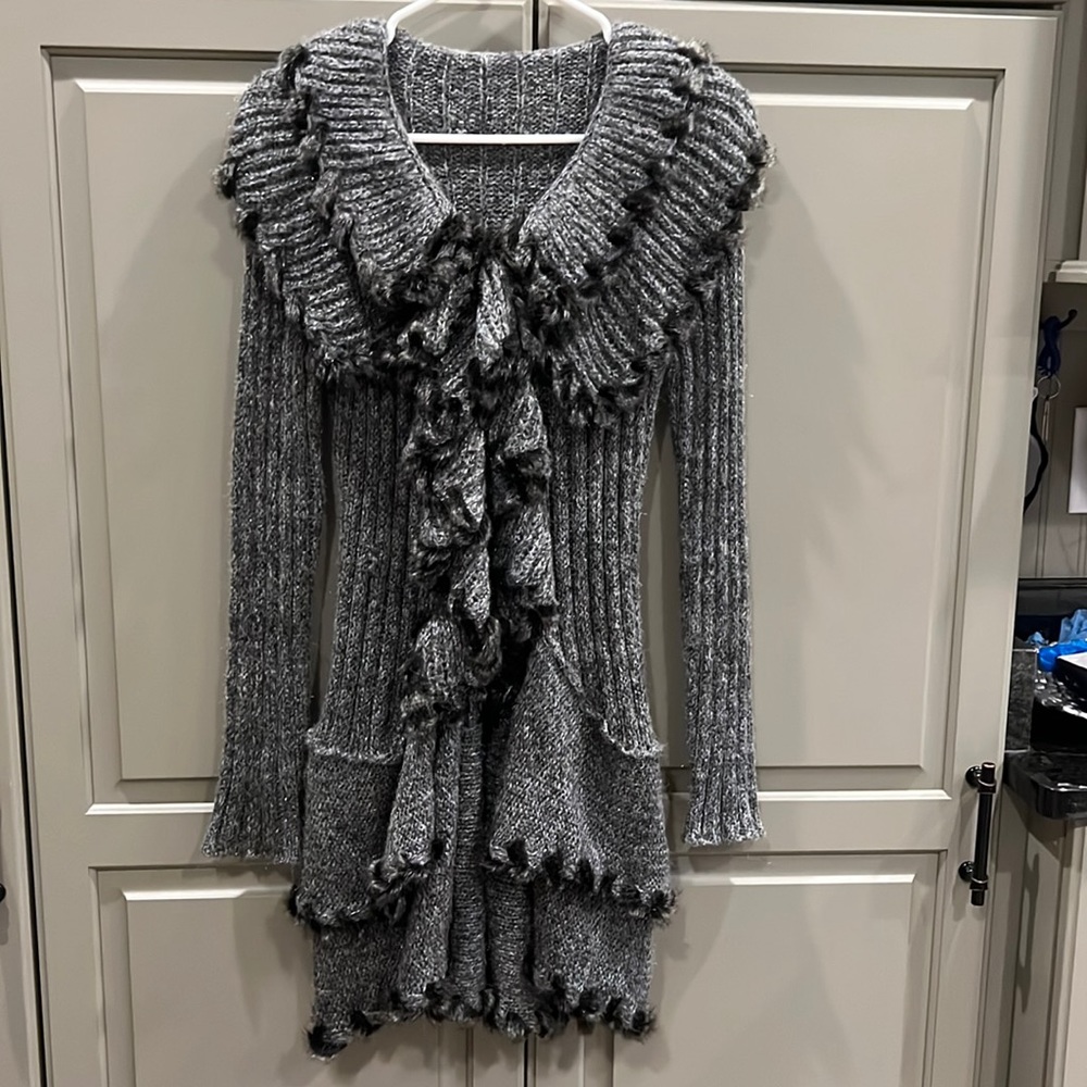 Small ruffled cardigan sweater